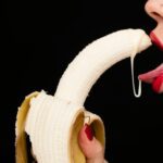 woman eating a banana