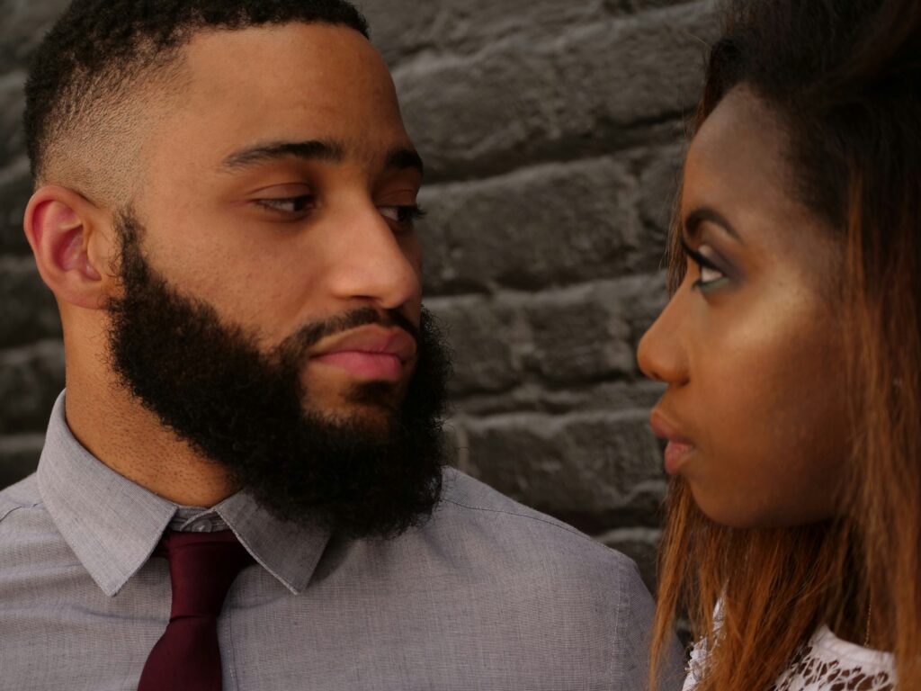 man and woman gazing at one another