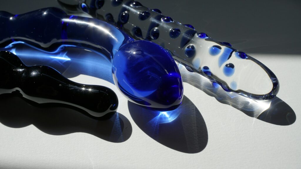 Three glass dildos