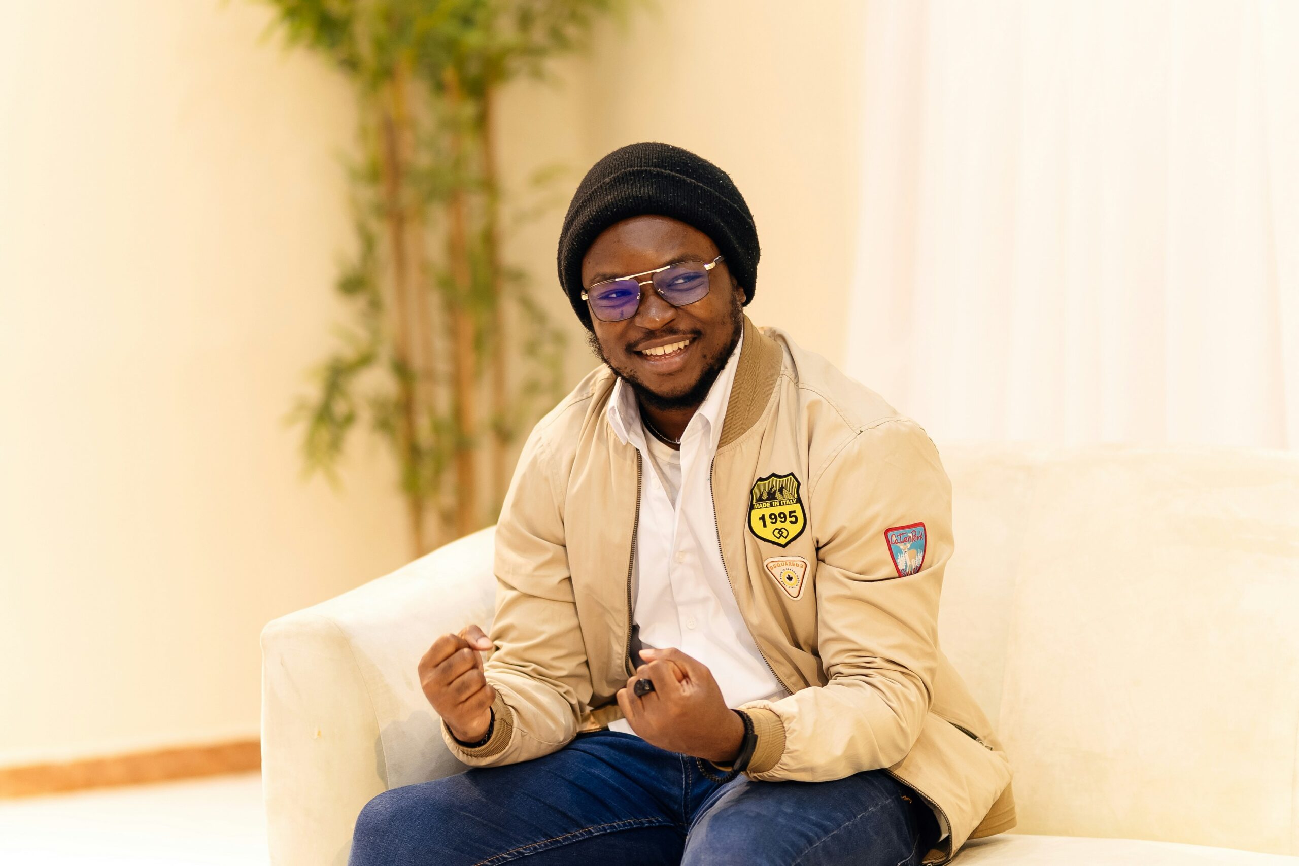 Man in a hat smiling