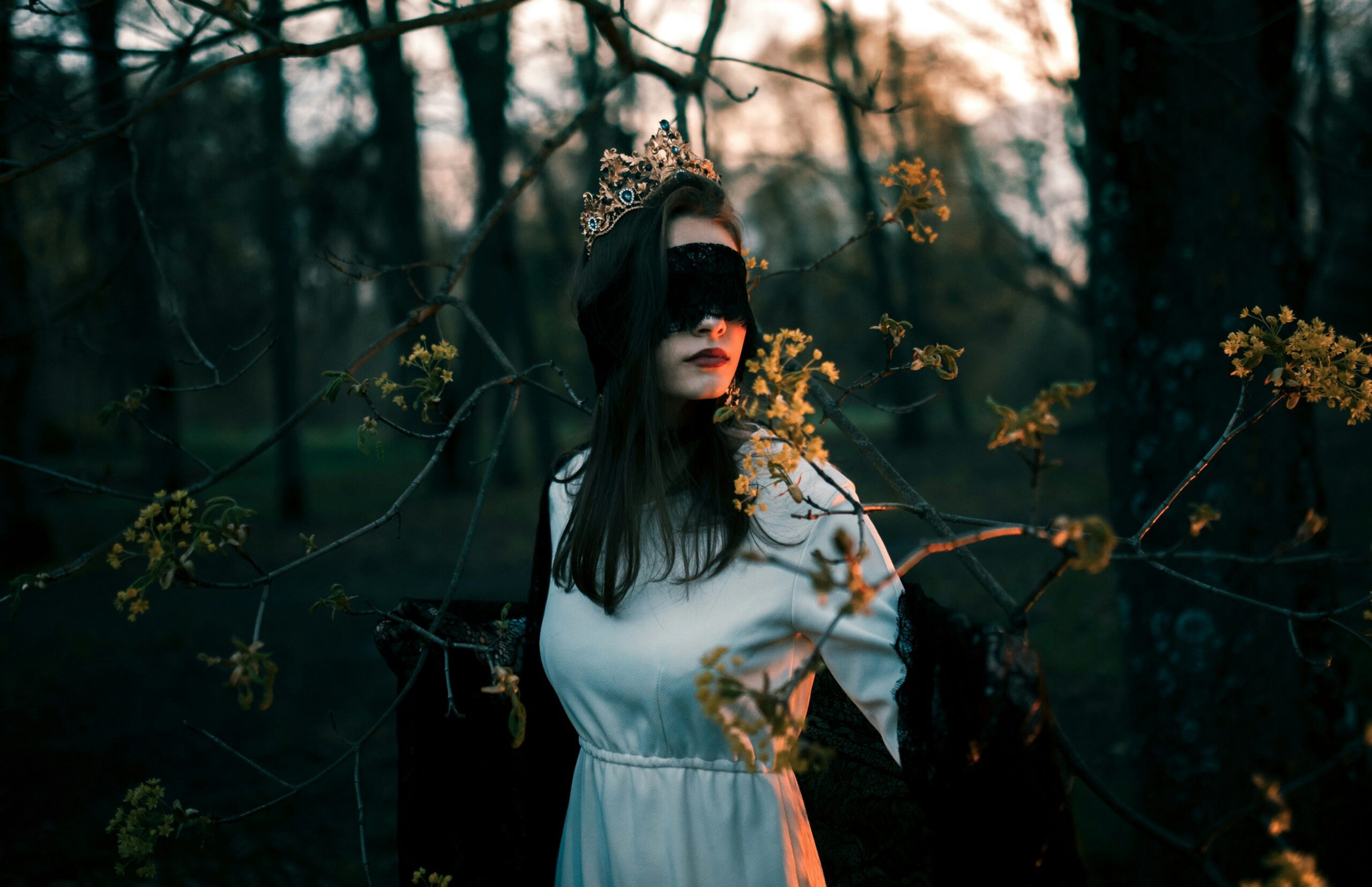 Masked woman in the forest