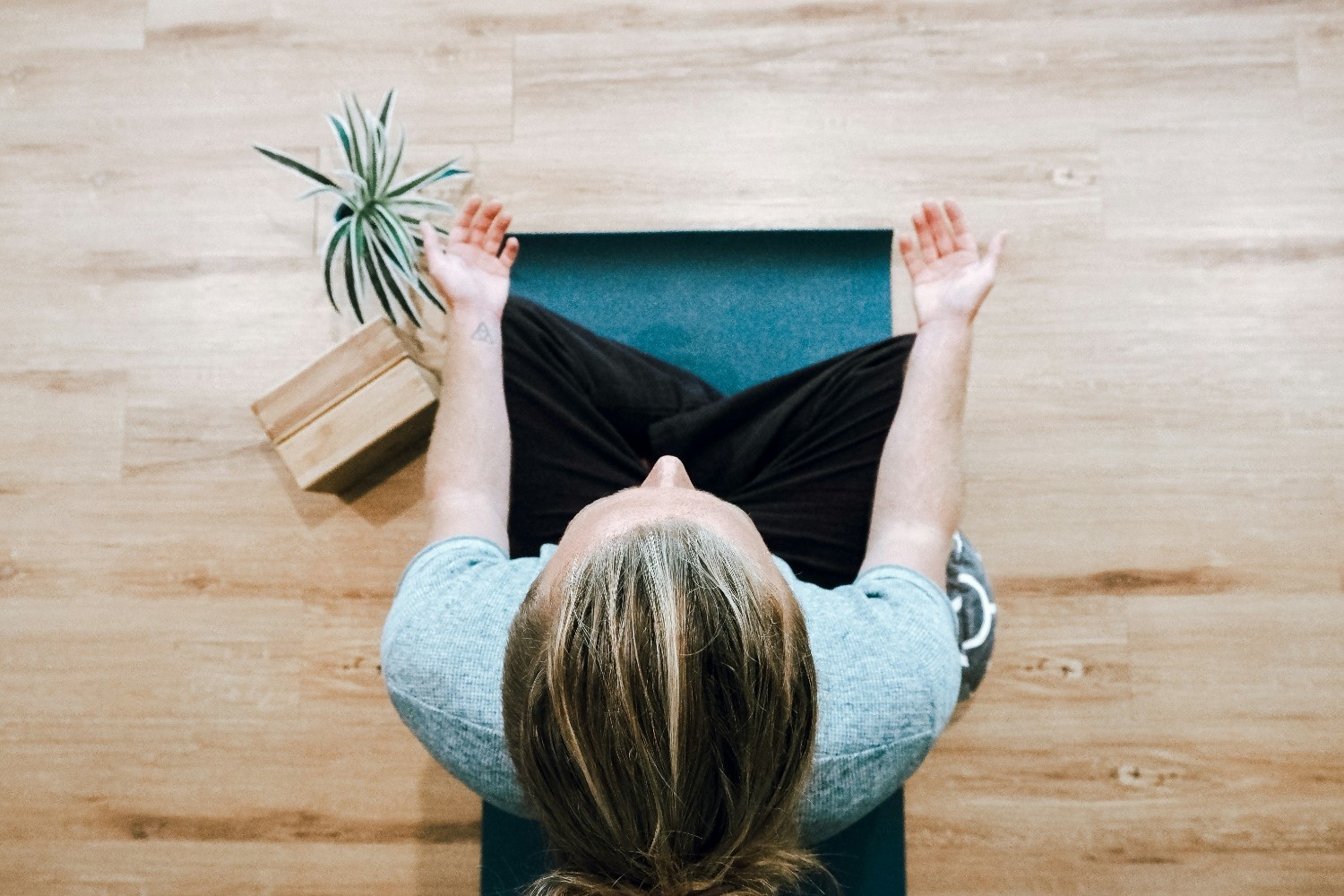 Man meditating on the floor