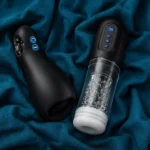 Two black male masturbators with different designs on blue fabric