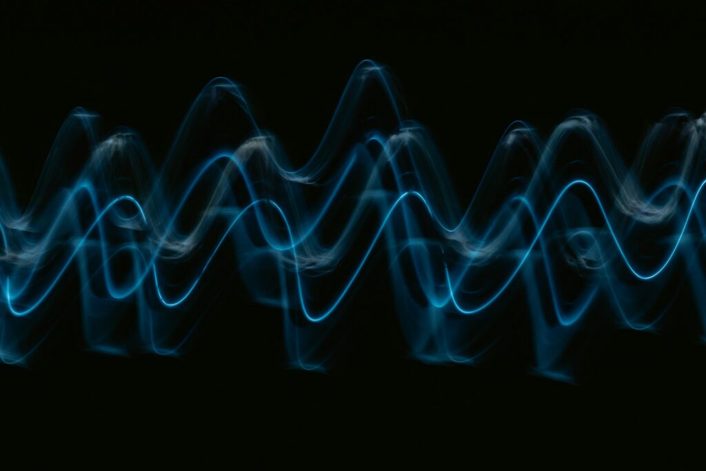 blue vibrations on black background